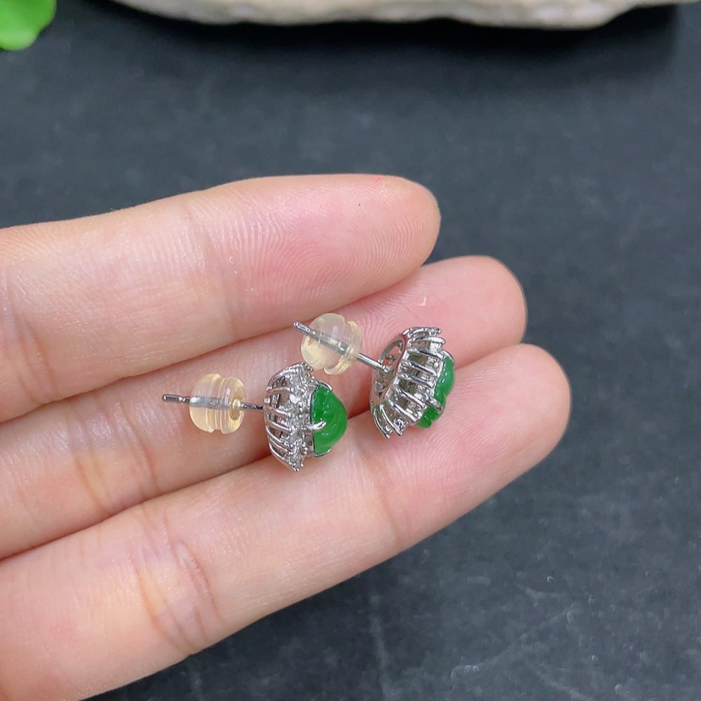 HKHQ jadeite earrings featuring smooth, polished jadeite stones set in a simple earring design with no gold or diamonds.