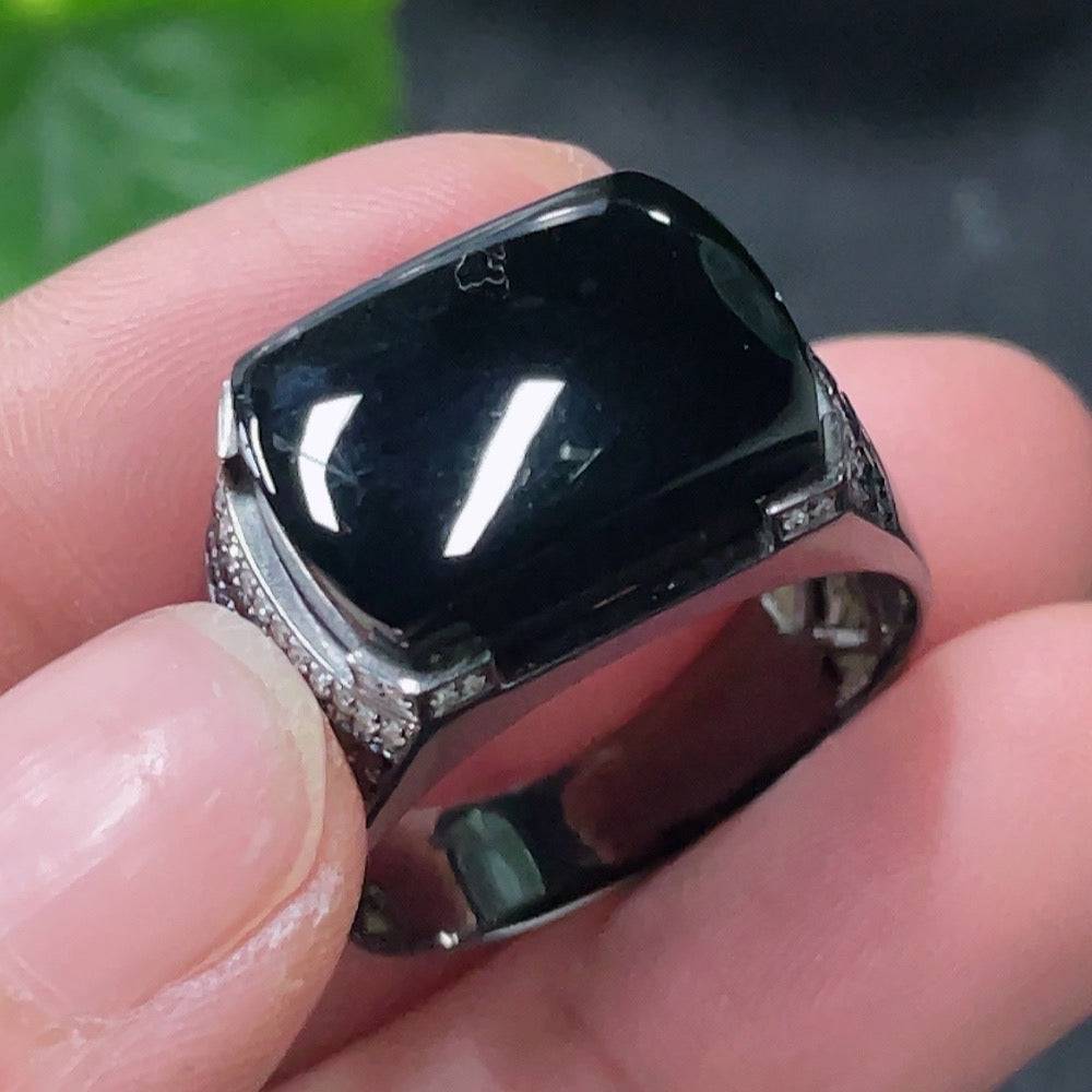 Huiliu Jadeite ring with diamond accents, showcasing a polished green jade gemstone and intricate design details.