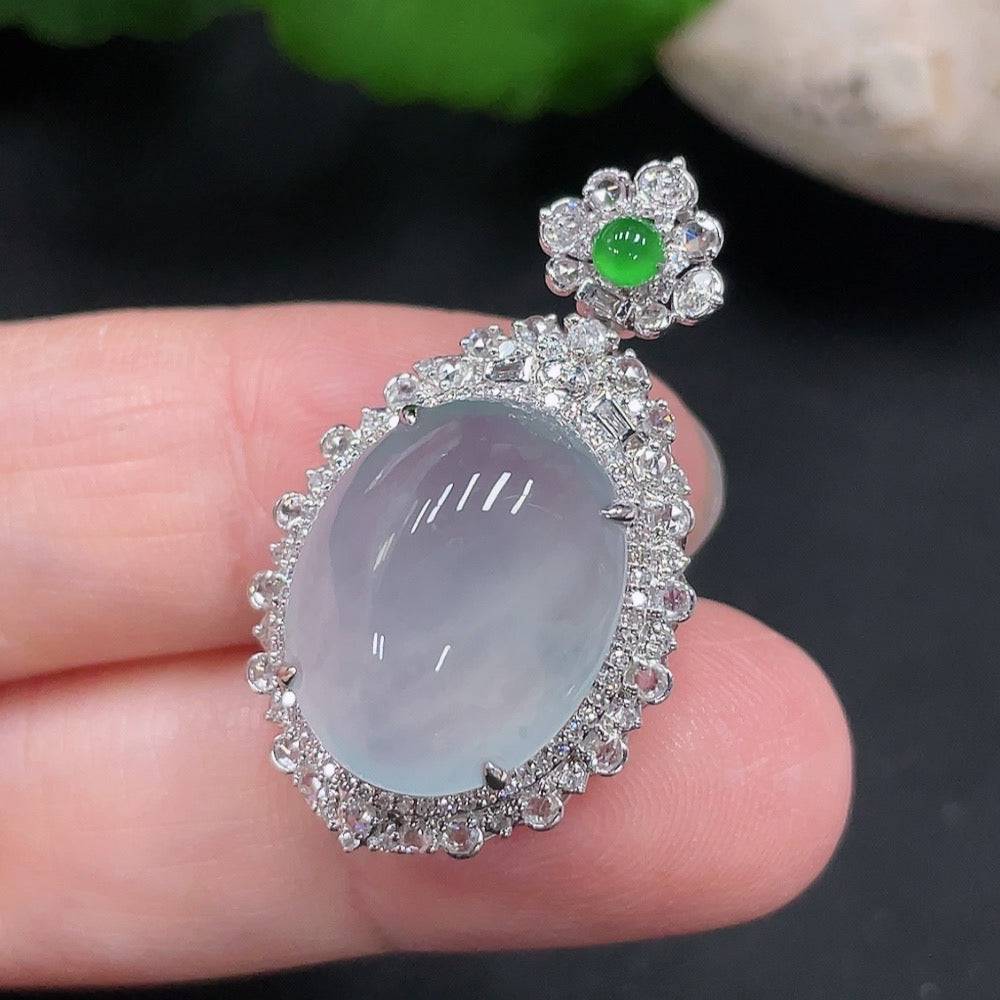 Jadeite pendant with 18K gold mount and diamond accents, crafted by HUILIU HQ, showcasing a polished jade gemstone.