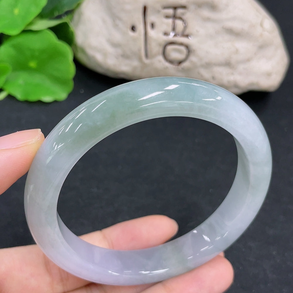 HKHQ Jadeite round bangle in size 58, weighing 56.1g, featuring smooth, polished jadeite with a rounded design.