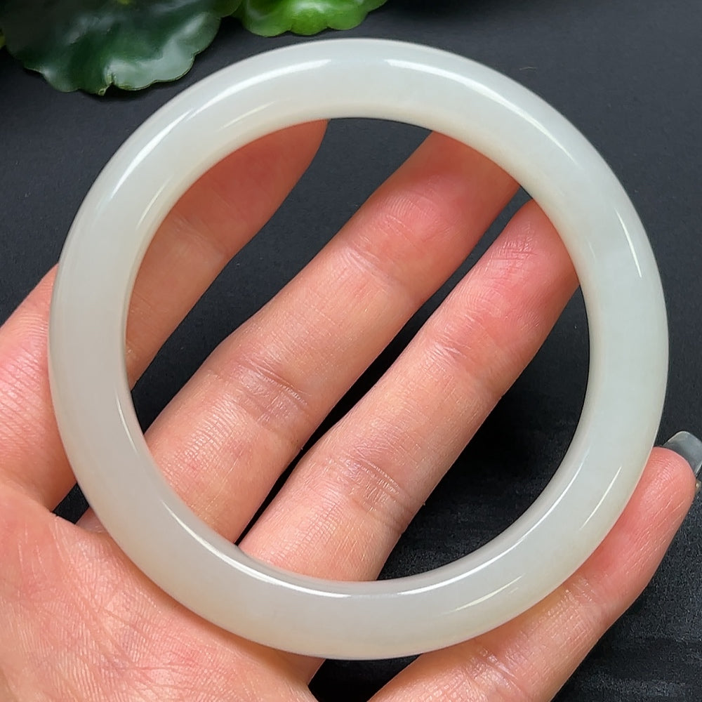 HKHQ Hetian Jade round bracelet, 58.9mm diameter, crafted from high-quality jade, weighs approximately 54.15g, natural and smooth finish.