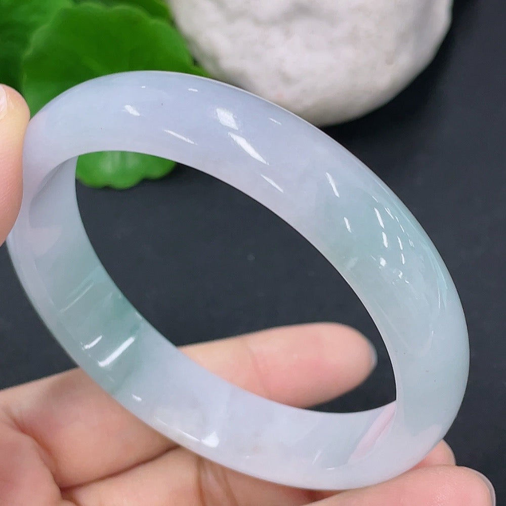 Jadeite round bracelet with a 54.8mm diameter, HKHQ brand, showcasing smooth, polished jade stones on a white background.