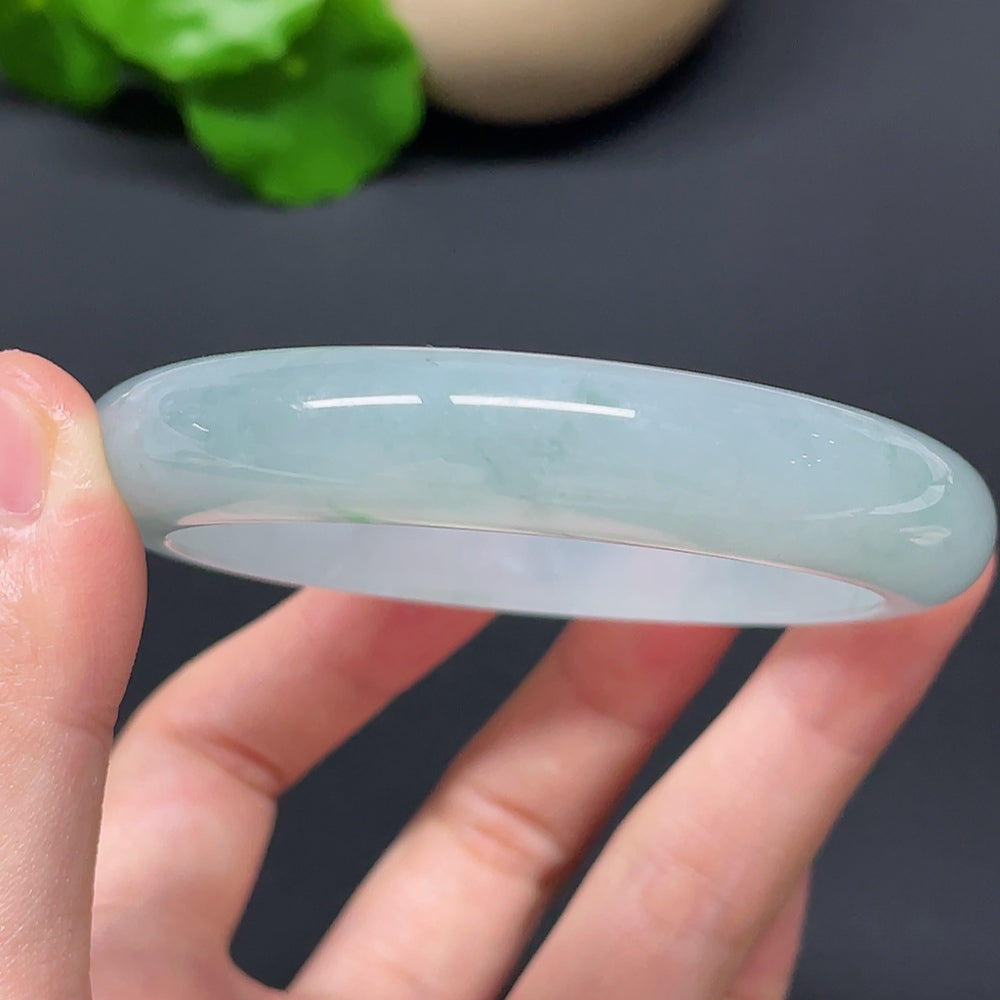 HKHQ jadeite round bangle in size 57.2, weighing 56.76g, showcasing smooth, polished jadeite with a circular design.