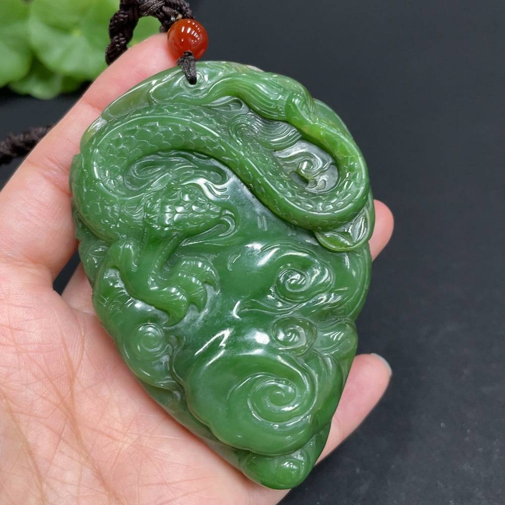 Huiliu HQ Hetian Jade hand-carved dragon sculpture, bi jade carving with intricate dragon details, certified by Huiliu.