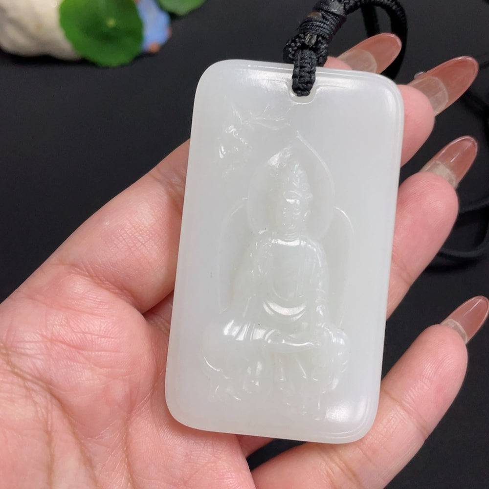 Huiliu certified Hetian jade Guanyin pendant with rope, featuring detailed carved figure, natural greenish hue, and smooth polished surface.