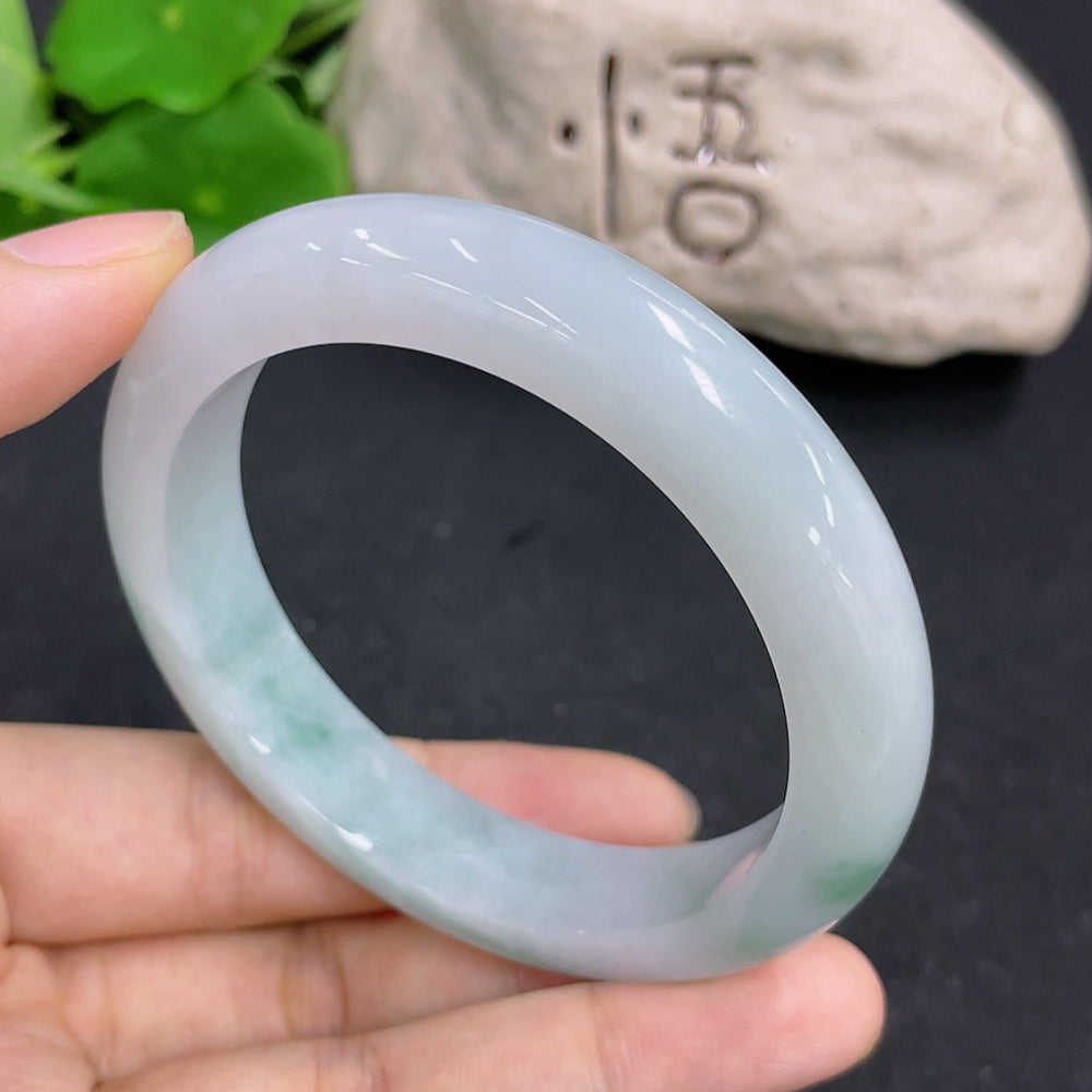 Jadeite round bracelet by HKHQ with a 58.6g weight and size 56.5, featuring smooth, polished green jade beads.