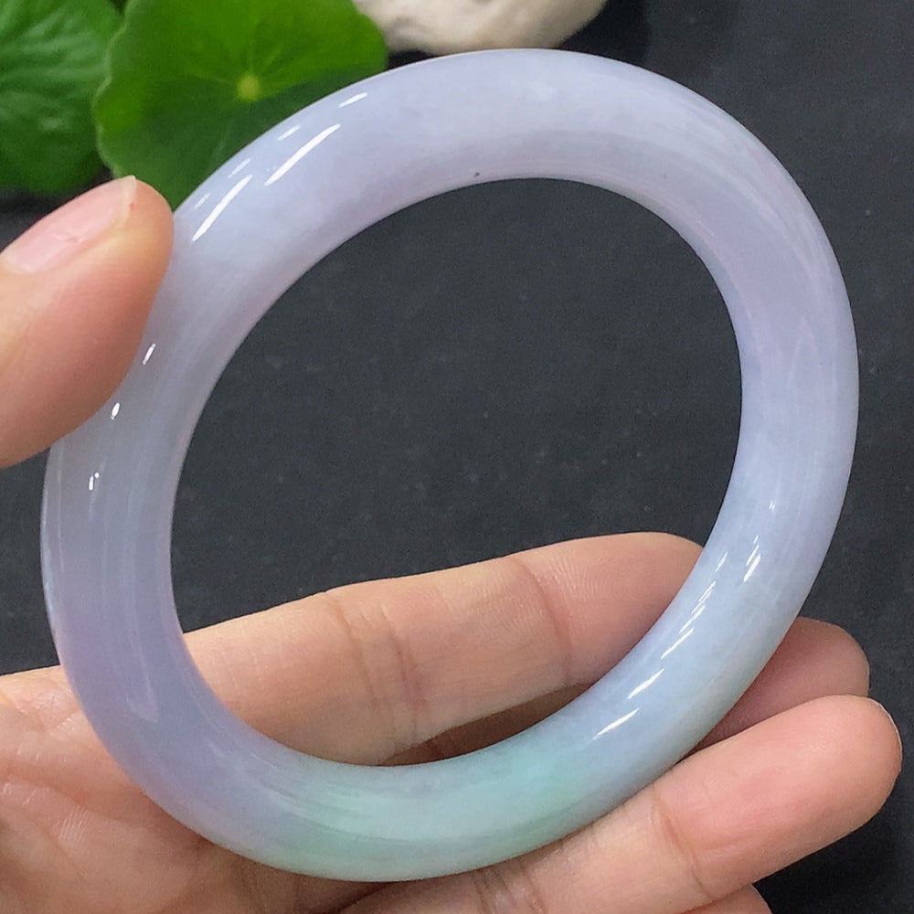 HUILIU HQ jadeite round bangle with a smooth surface, weighing approximately 58g and size 55.6, showcasing rich green jade color.
