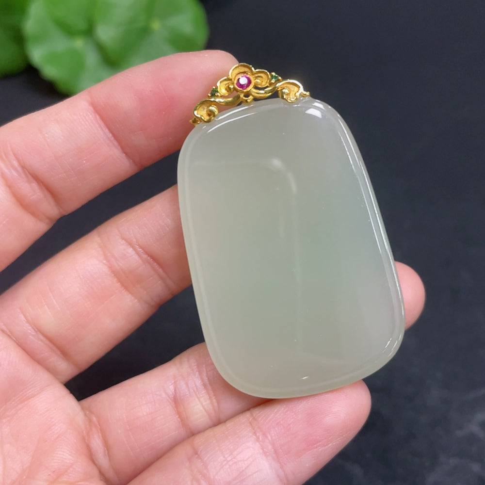 Huiliu Certified Hetian Jade pendant with plain design and clasp, showcasing smooth, polished green jade gemstone.