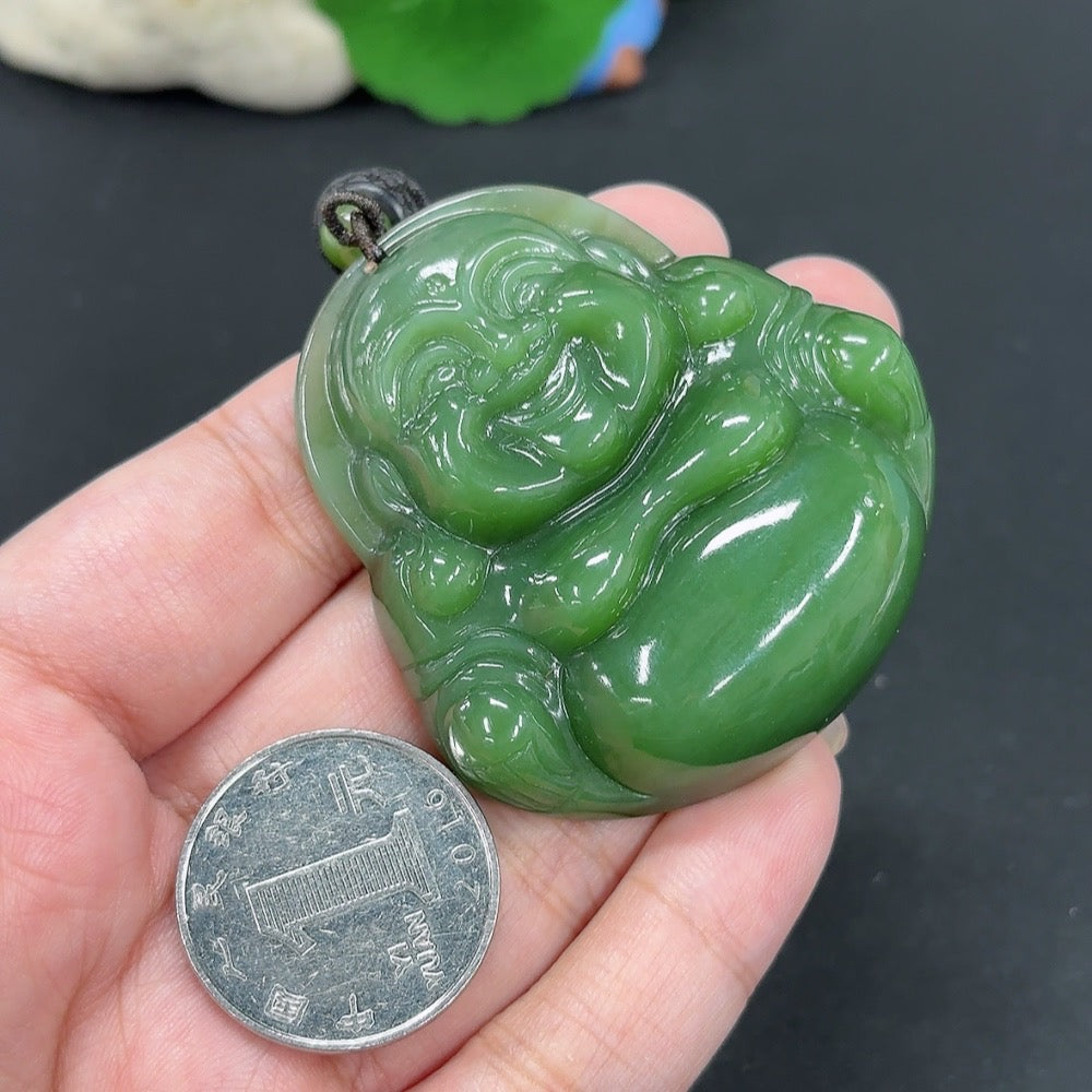 Hetian jade pendant featuring a Buddha figure with a rope, weighing approximately 58.6g, crafted by HKHQ.