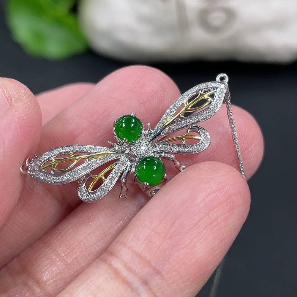 Huiliu Jadeite cabochon pendant necklace with diamond accents, showcasing a polished green jade stone on a silver chain.