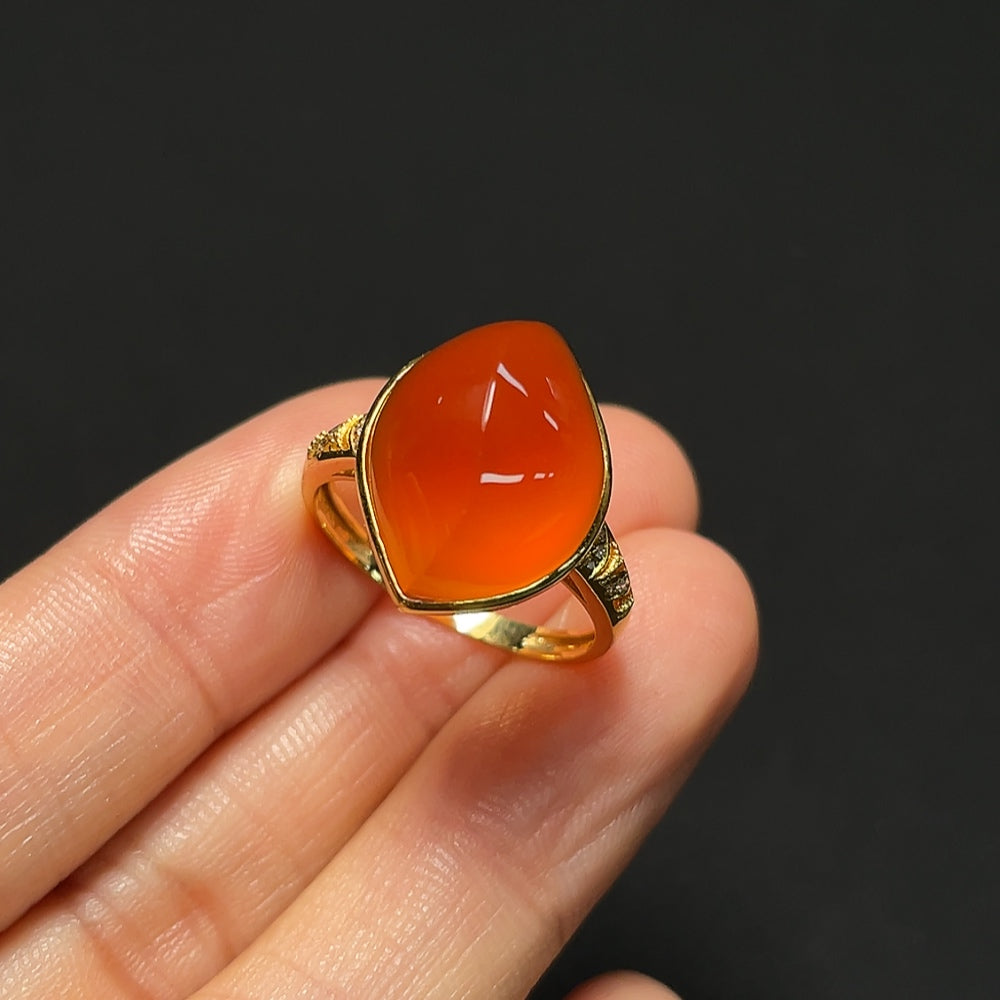 18K gold Southern Red Agate ring with diamond accents, featuring a sleek design and vibrant red gemstone.