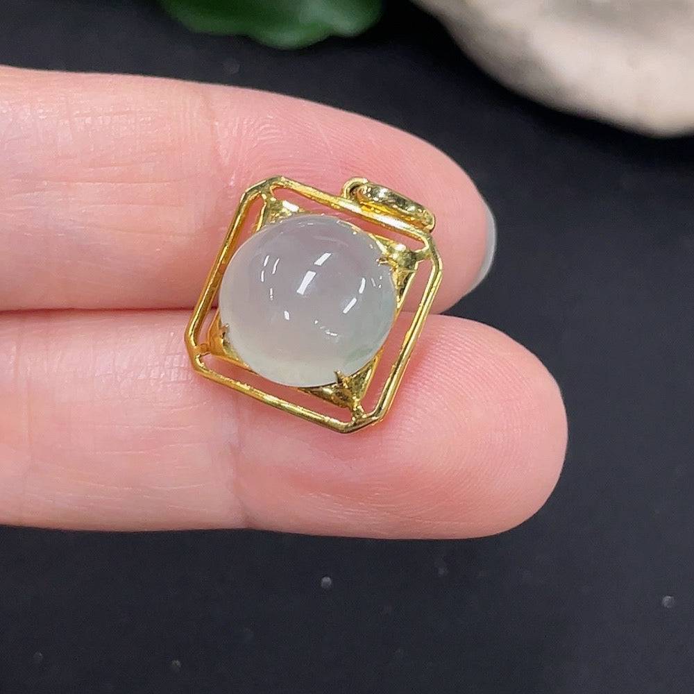 Huiliu certified jadeite inlaid pendant with intricate design, showcasing smooth jade surface and detailed craftsmanship.