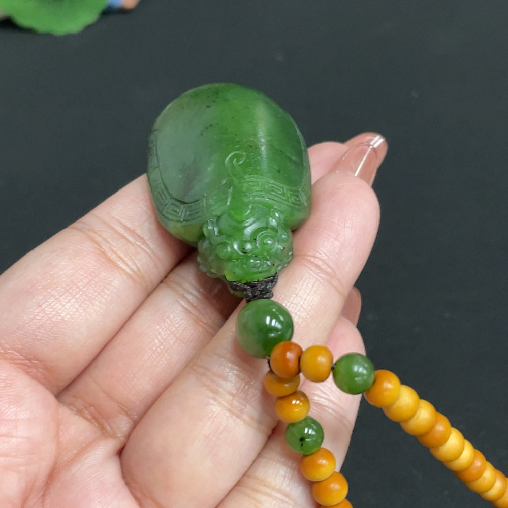Hetian jade jasper pendant featuring a dragon turtle design, crafted by HUILIU HQ, with a chain, weighing approximately 39.5g.