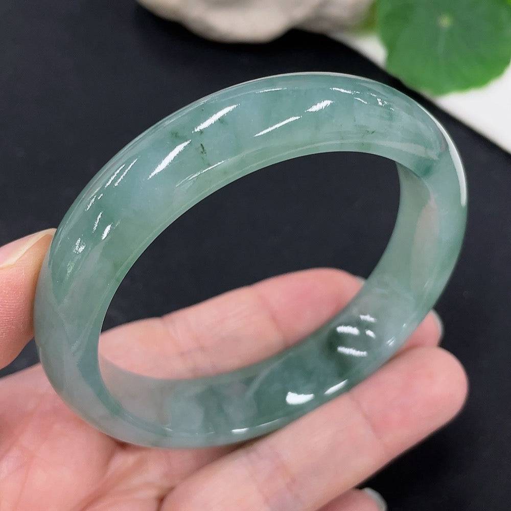 Huiliu Jadeite round bracelet featuring smooth, polished jade beads with a natural green hue, certified by Huiliu HQ