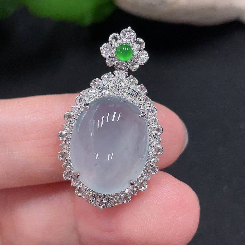 Jadeite pendant with 18K gold mount accented with diamonds, from HUILIU HQ, showcasing a polished green jade stone and gold setting.