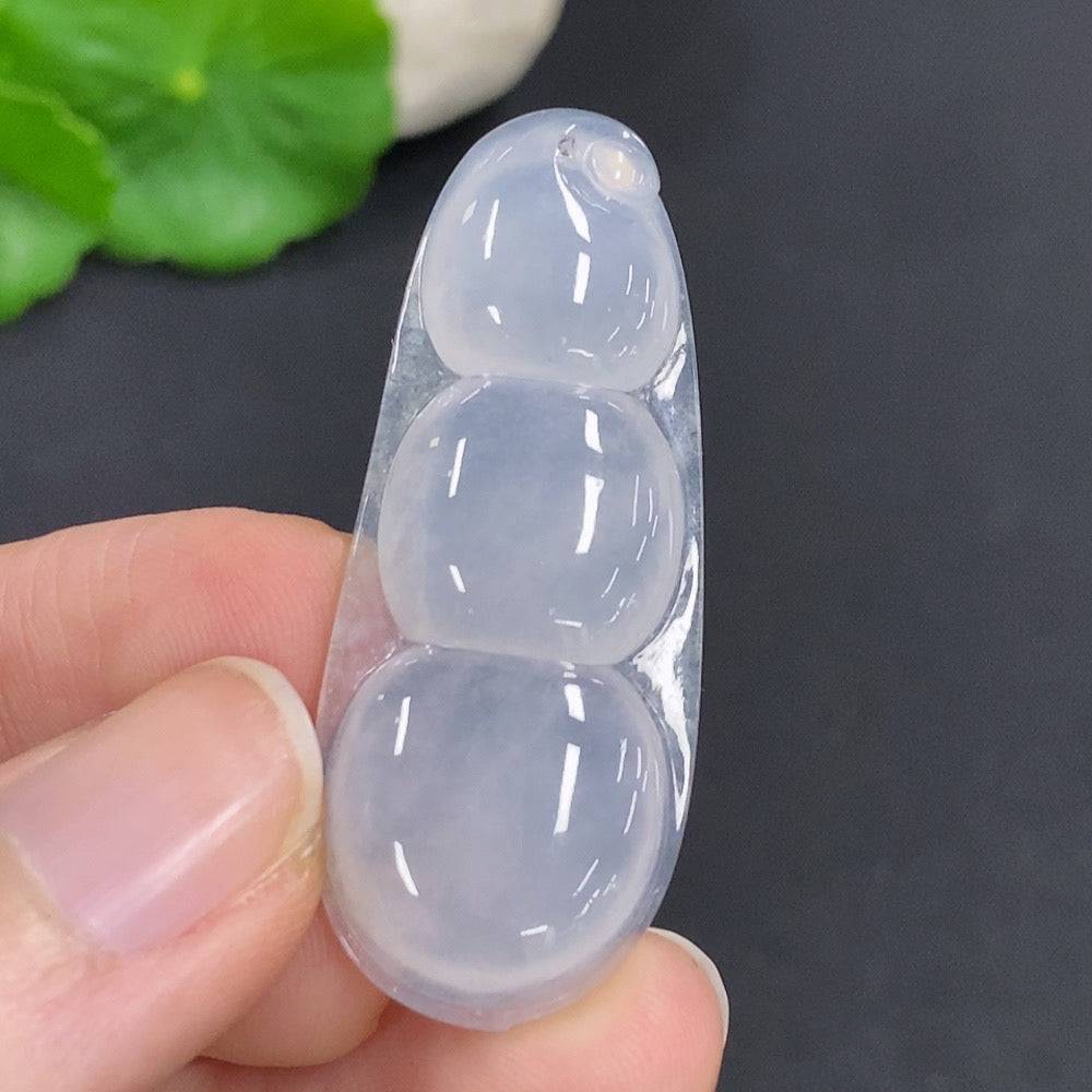Jadeite lucky bean pendant from HUILIU HQ, handcrafted jade jewelry weighing approximately 8.7 grams, showcasing smooth green jade details.