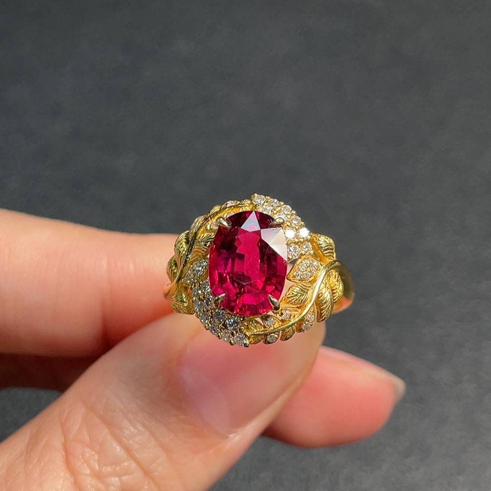 Huiliu certified gemstone tourmaline ring with a gold 37% content band, featuring a vibrant pink-green tourmaline gemstone.