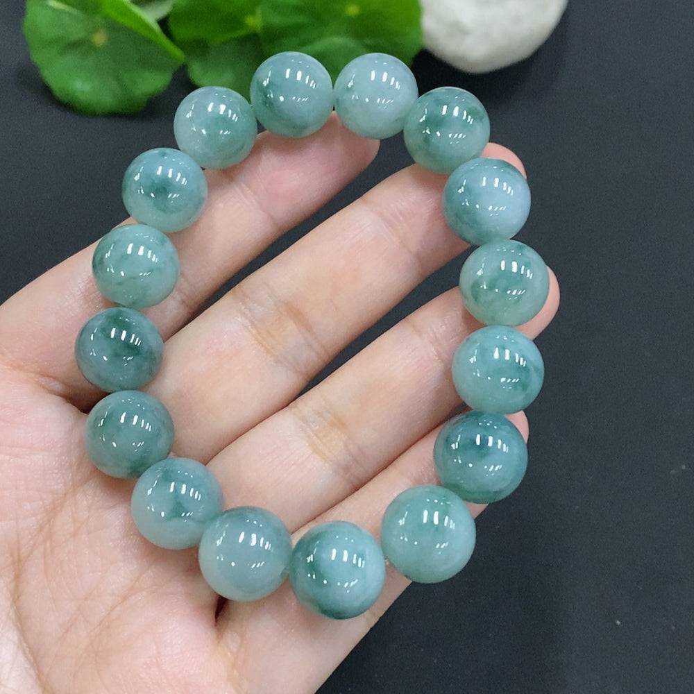 Huiliu Jadeite bead necklace featuring 12.4mm smooth, polished jade beads, crafted and certified by HUILIU HQ.