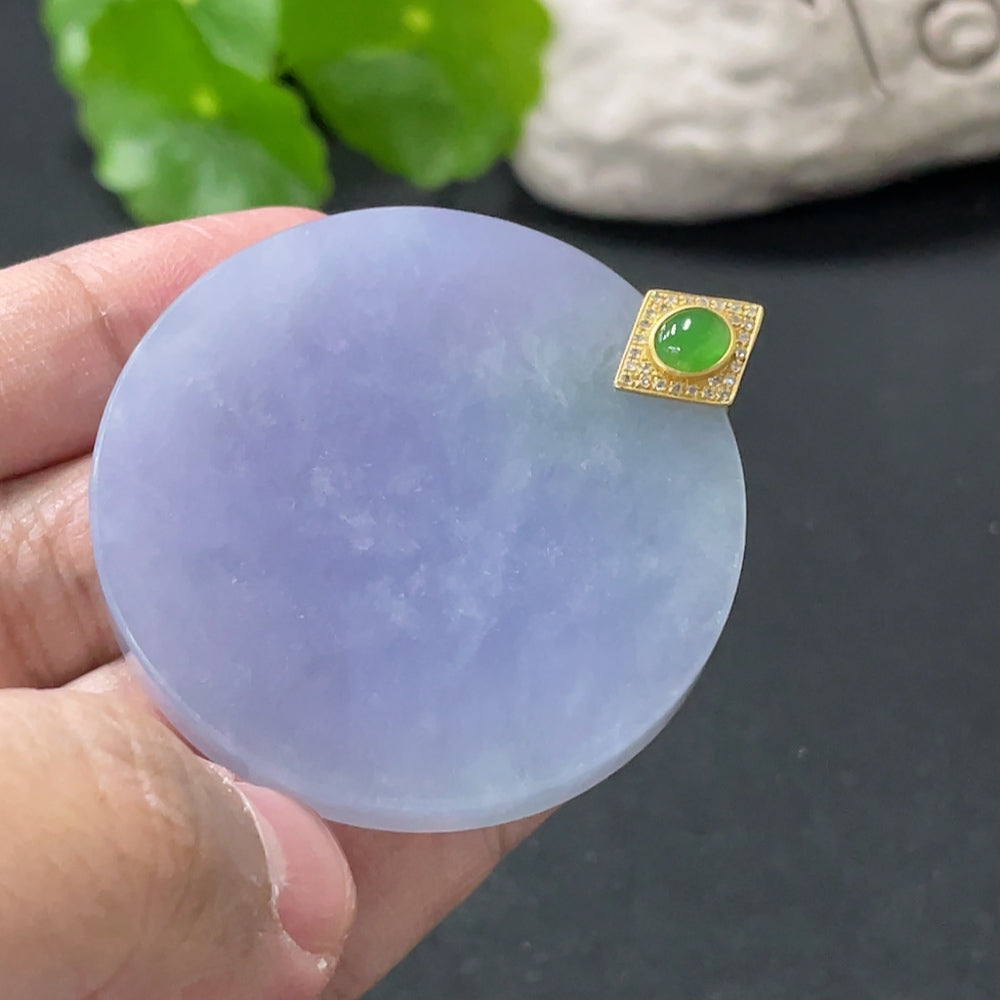 Jadeite plain pendant with 18K gold clasp and diamond accents, shown in a close-up image highlighting the elegant design.