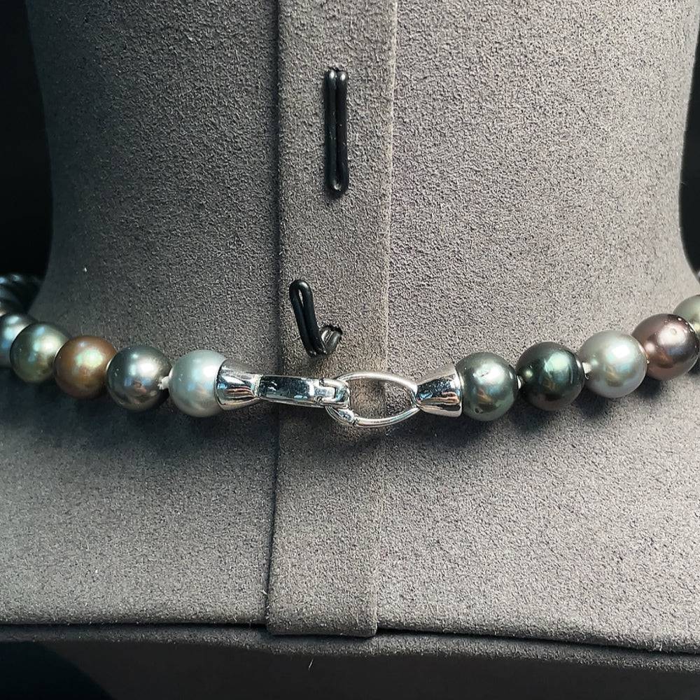 HUILIU HQ seawater pearl necklace with 8.1-10.6mm pearls, non-gold, weighing 52.23g, showcasing the lustrous pearls strung together.