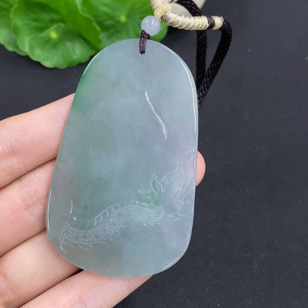 Jadeite Amitabha pendant from HUILIU HQ, crafted from smooth green jade with intricate Buddhist iconography.