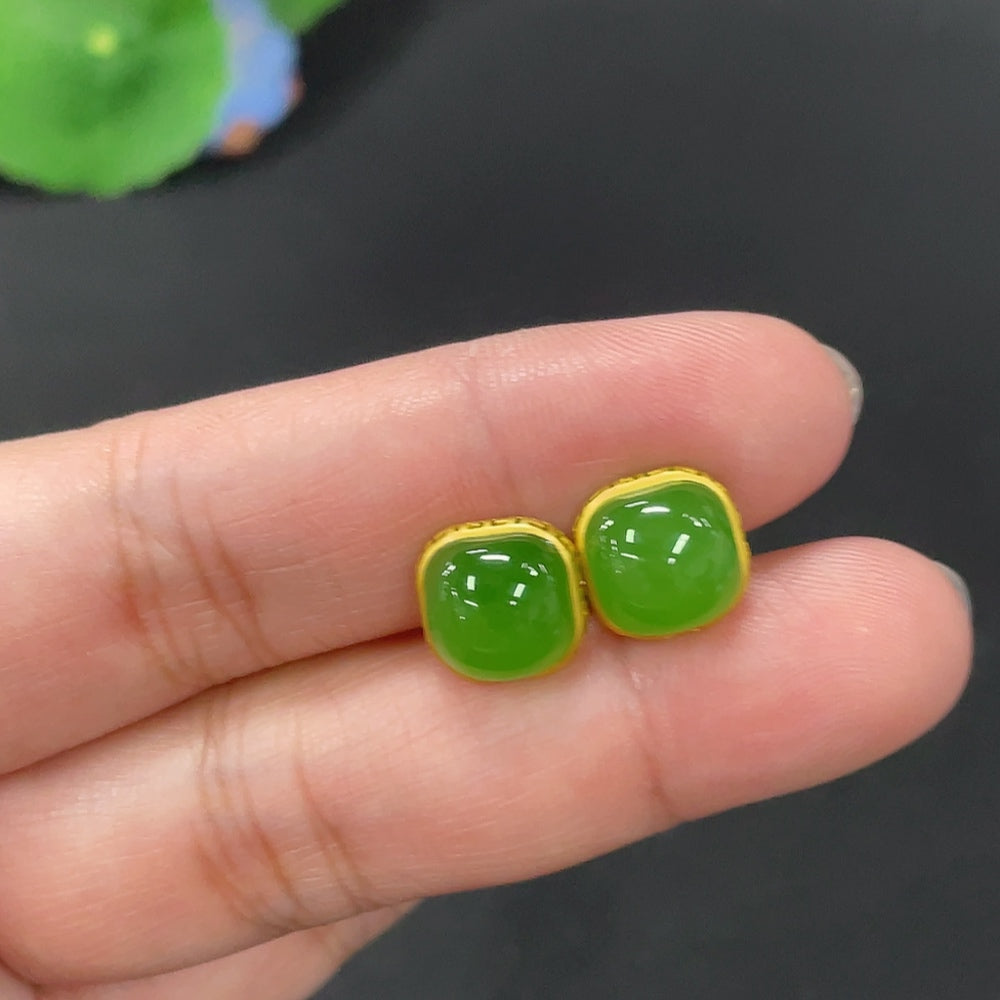 Huiliu certified Hetian jade Jasper inlaid earrings featuring elegant jade stones and intricate metalwork design.