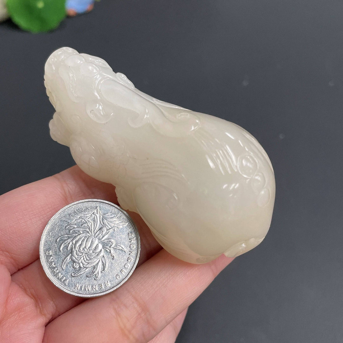 Huiliu Certified Hetian Jade Handheld Pi Xiu figurine, detailed jade carving, traditional Chinese mythical creature, handheld size