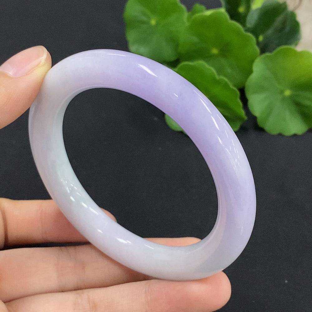 Round jadeite bangle by HUILIU HQ, size 56.5, featuring smooth polished surface and a total weight of 55.7g.