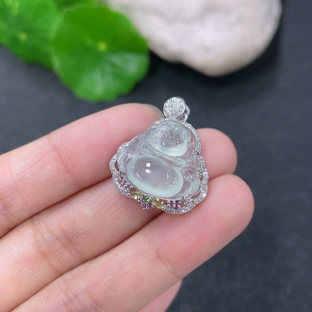 Jadeite inlaid Buddha pendant necklace in 18k gold with diamond accents, weighing approximately 3.63g.