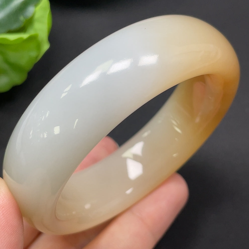 HKHQ Hetian Jade round bangle bracelet, size 55.2, 83.44g, showcasing smooth, polished jade with subtle natural variations.
