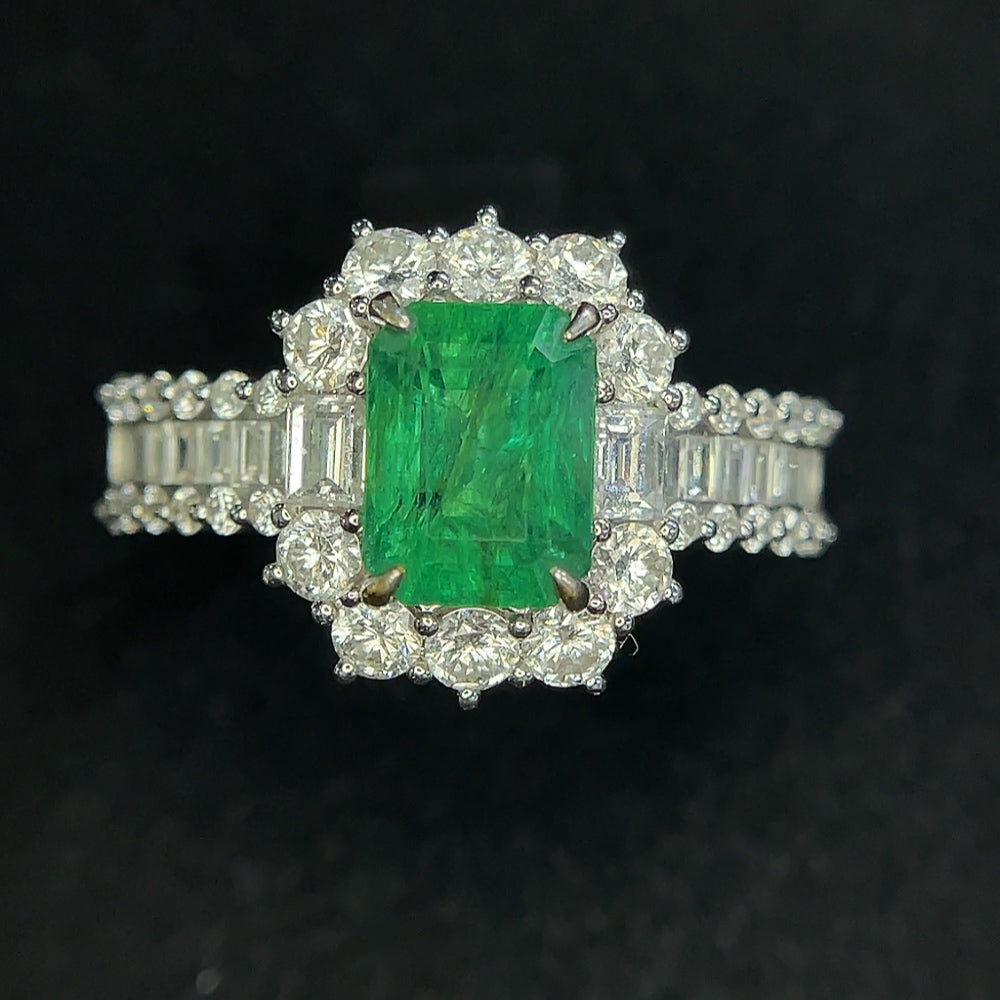 HKHQ emerald ring in 18K gold, size 19.5, with clarity-enhanced emerald, weighs approx. 6.23g, includes certificate