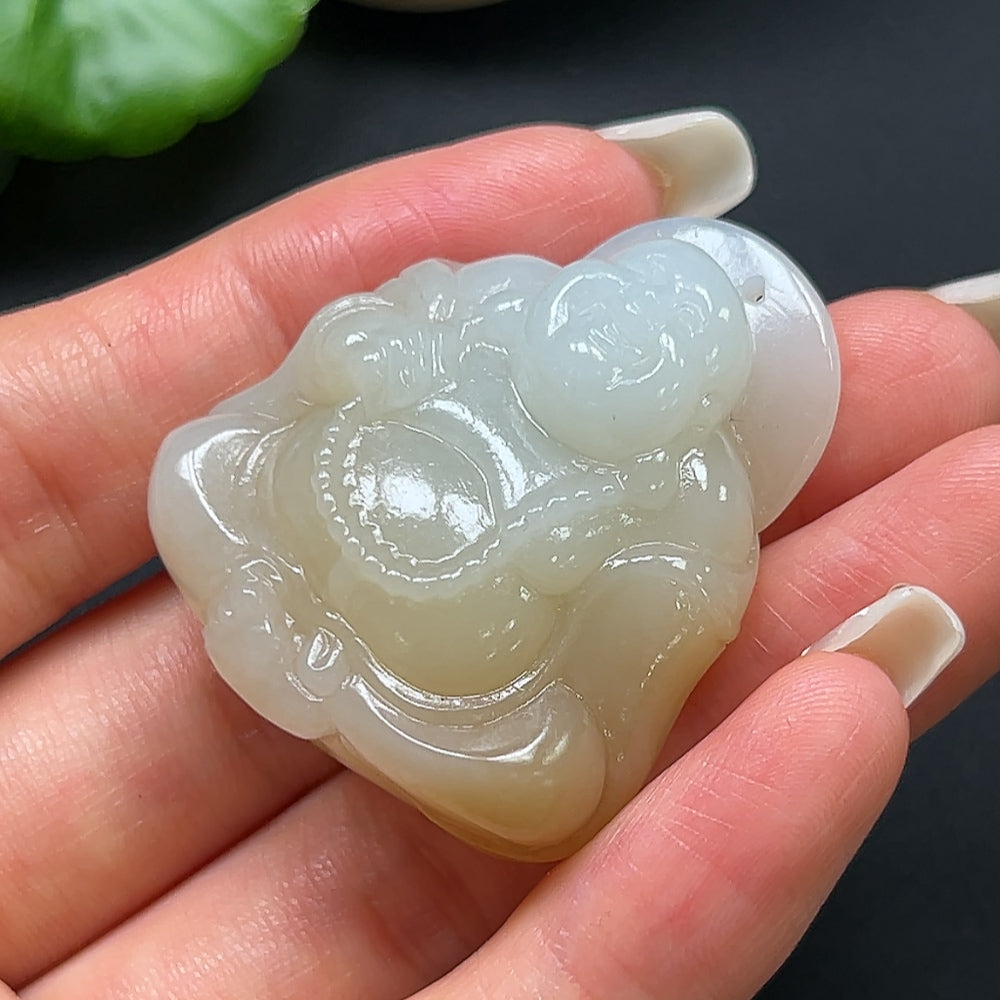 Hetian Jade Buddha pendant necklace by HKHQ featuring a carved jade Buddha charm on a delicate chain.