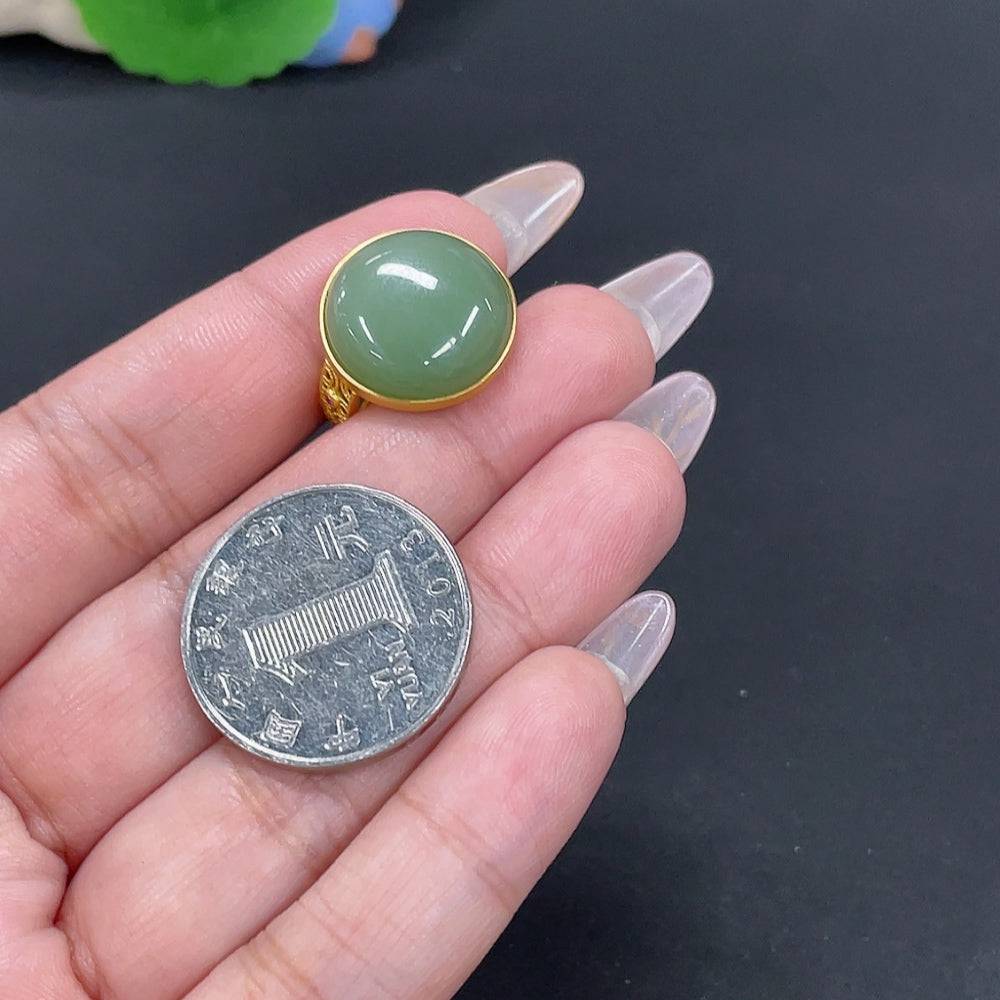 Huiliu HQ Hetian Jade Inlaid Ring featuring a polished jade stone set in a decorative band, certified by Huiliu.