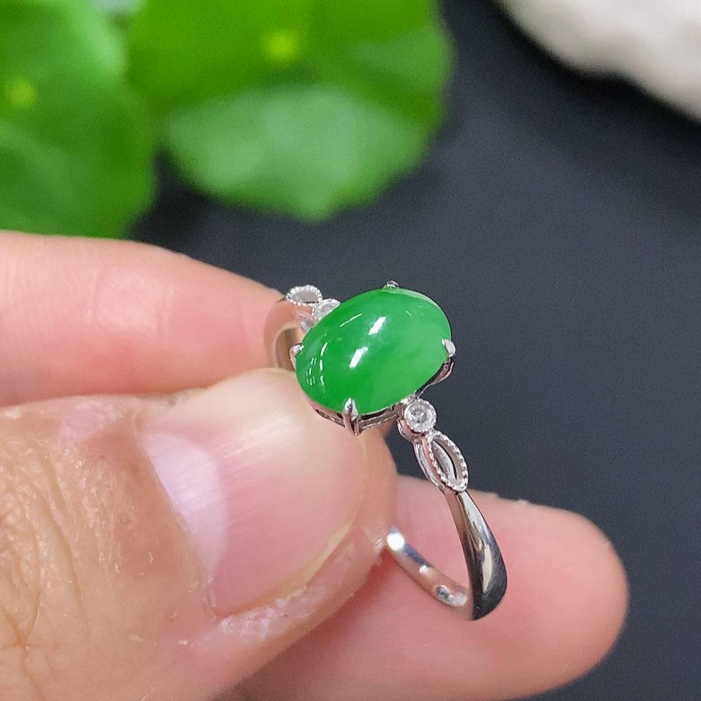 Jadeite cabochon ring in 18K gold with diamond accents, size 16, featuring a polished jade stone and intricate gold setting.