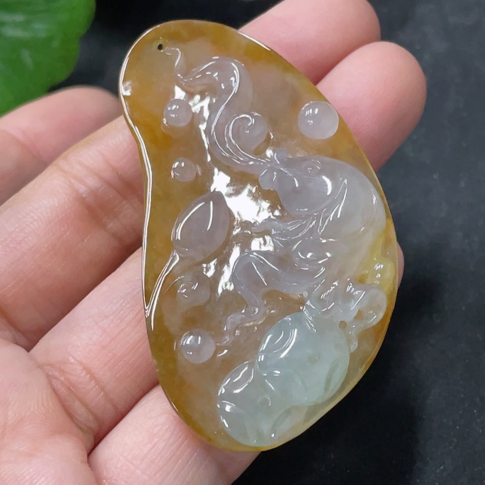 Huiliu Jadeite pendant featuring the Abundance Year After Year design, showcasing rich green jade with intricate craftsmanship.