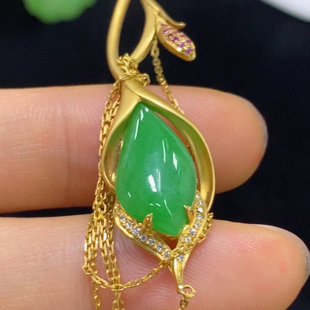Jadeite inlaid necklace with 18k gold and diamonds, featuring elegant jade pendant and intricate gold detailing.