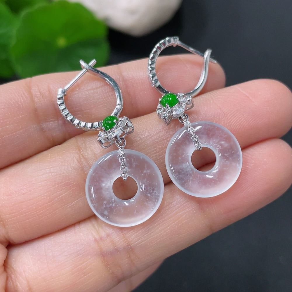 HUILIU HQ Jadeite earrings set in 18k gold with diamond accents, showcasing polished jade stones and sparkling diamond details.