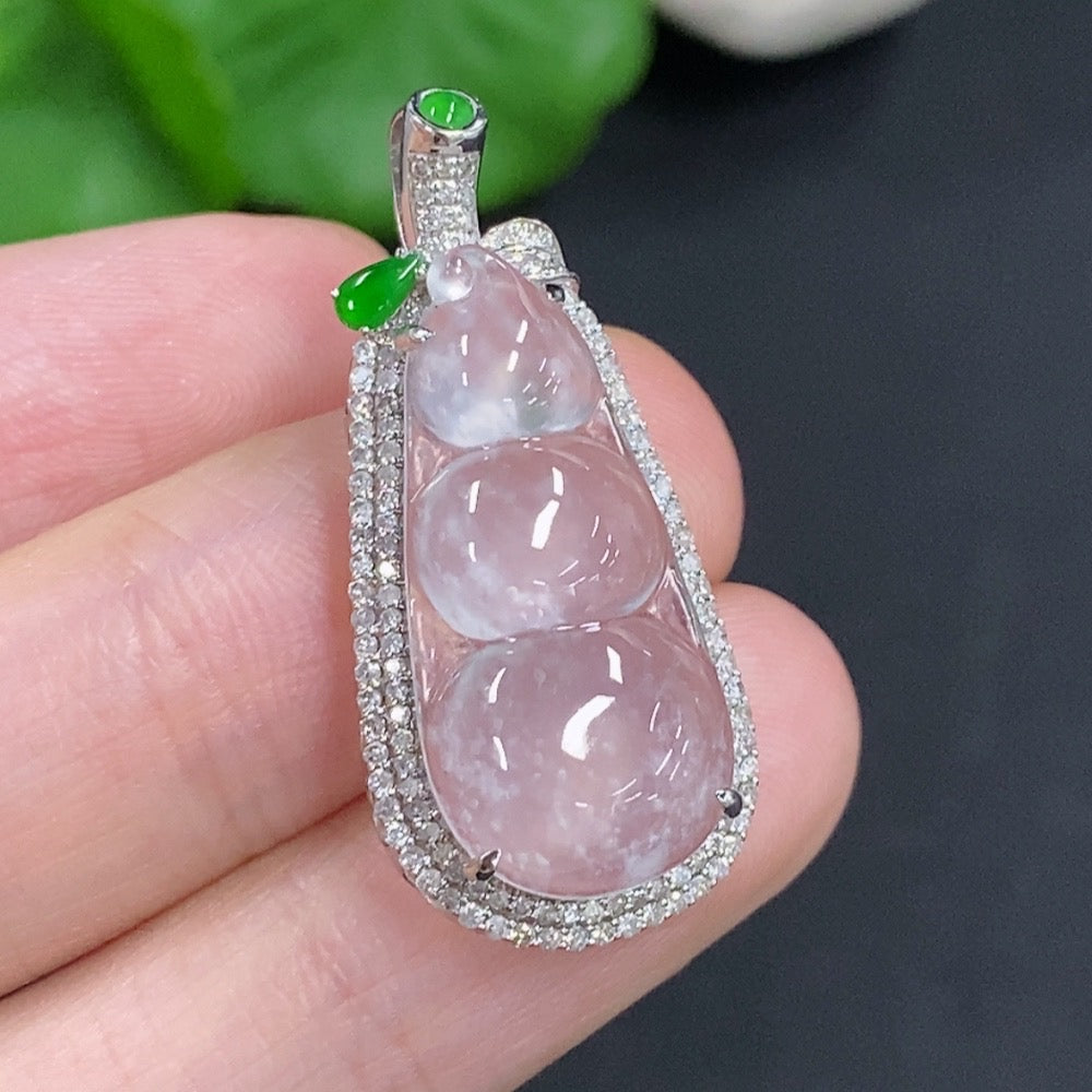 Jadeite lucky bean pendant with 18K gold accents and diamond details, crafted by HKHQ, weighs approximately 3.3 grams.
