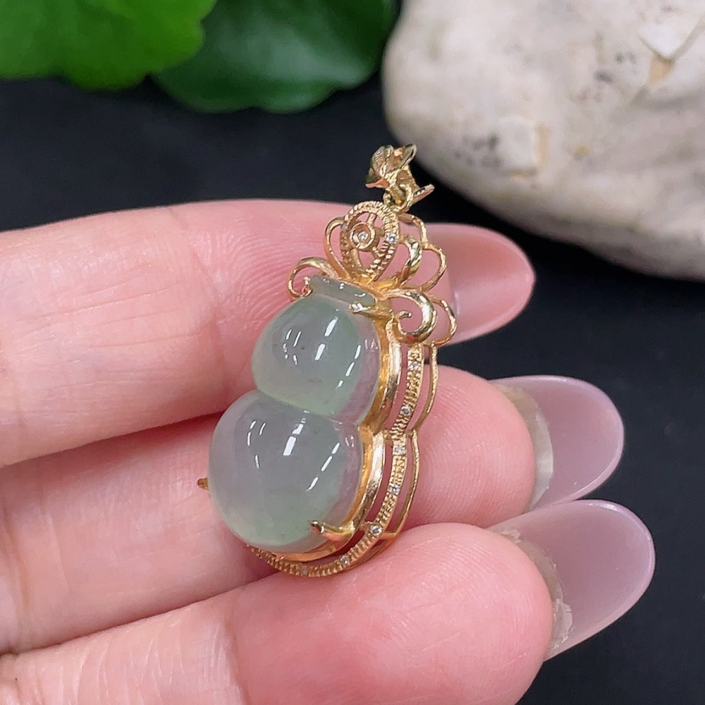 Jadeite gourd pendant with diamond accents, 18K gold setting, from HUILIU HQ, showcasing a smooth green jade stone with intricate details.