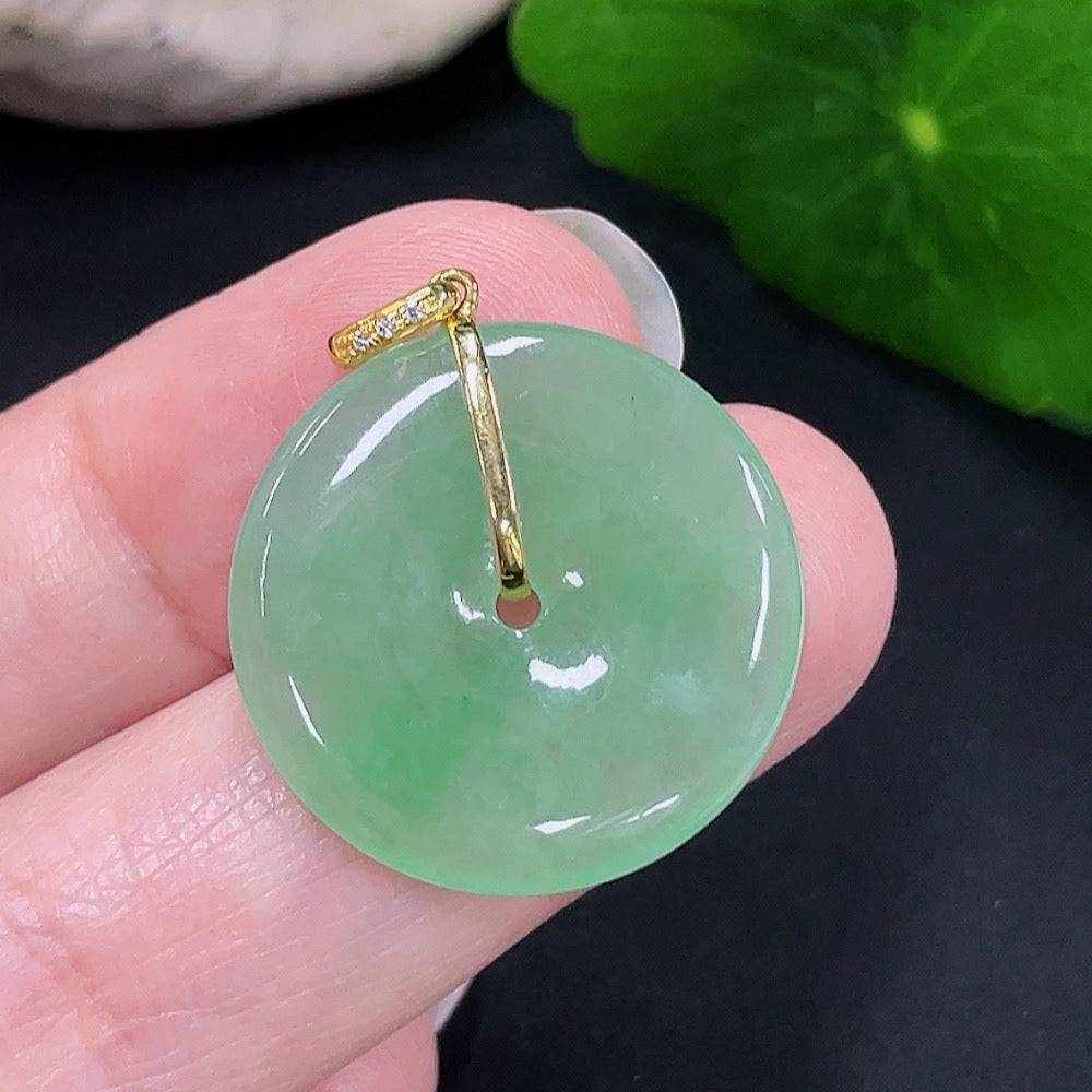 Jadeite Peace Knot pendant with diamond accents in 18K gold, crafted by HUILIU HQ, weighing approximately 4.2 grams.