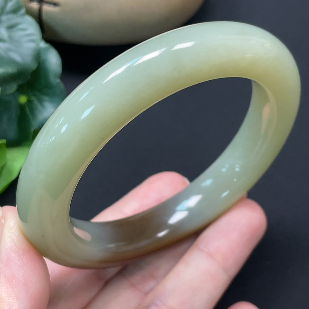 Hetian jade round bracelet by HKHQ featuring a 58.1mm diameter and approximately 73.58g weight, showcasing smooth, polished jade beads.