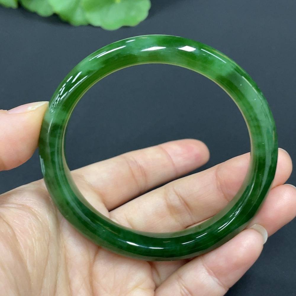 Huiliu certified Hetian jade round bracelet featuring smooth, polished jade beads on a delicate string.