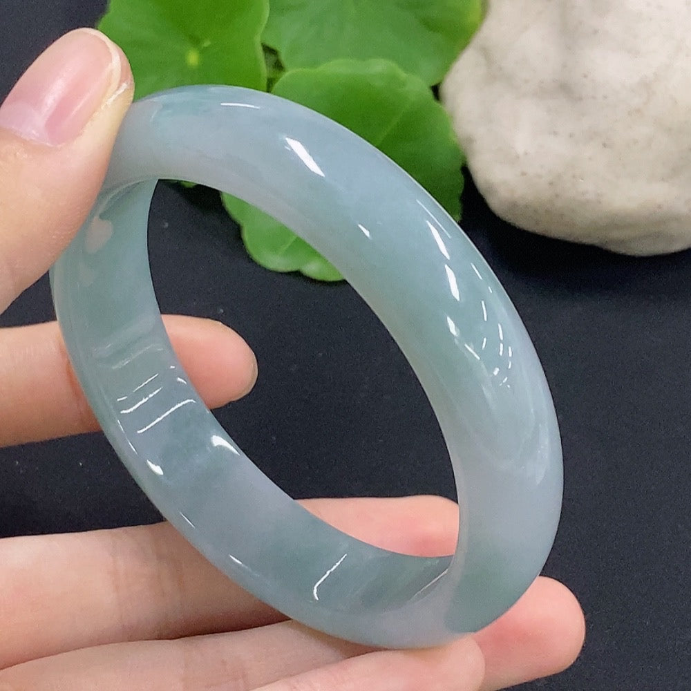 HKHQ jadeite round bangle bracelet, size 56.8, weighing 56.55g, showcasing smooth, polished jadeite with a glossy finish.