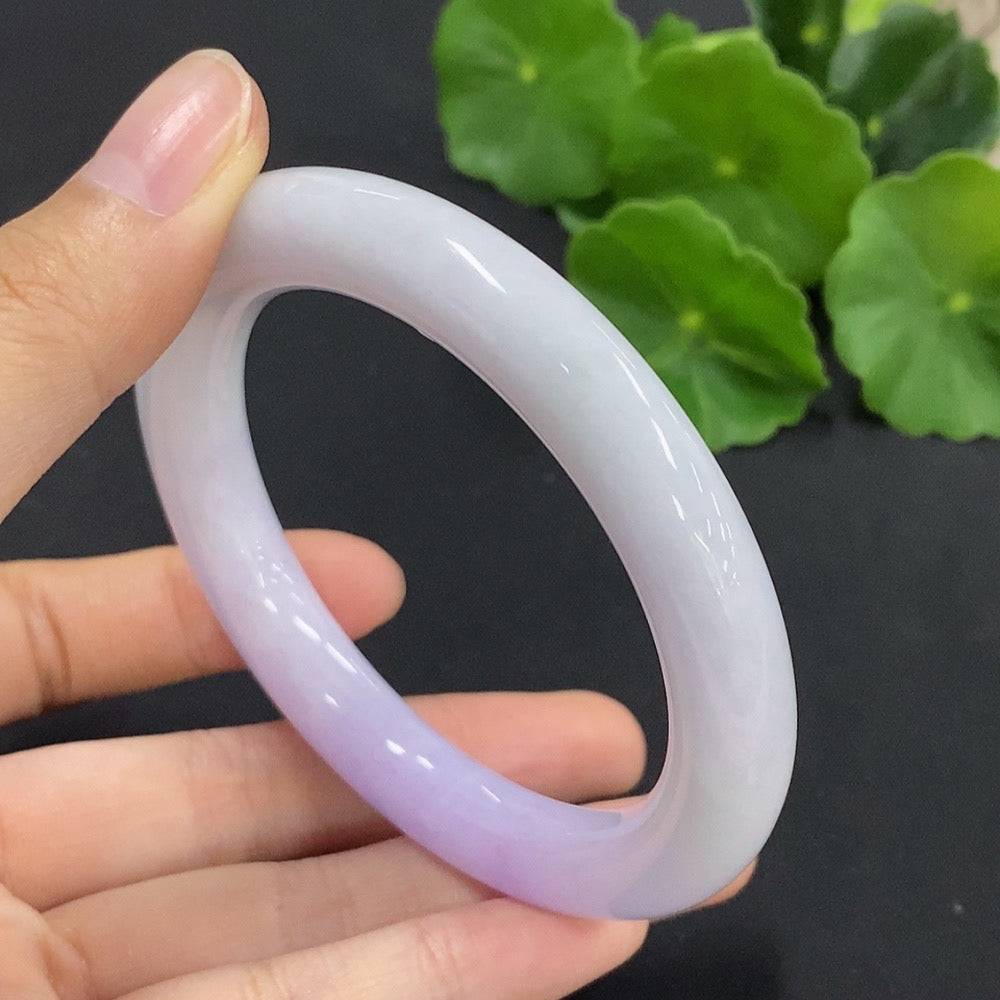 Jadeite round bangle with size 56.5 and weight 55.7g, crafted by HUILIU HQ, showing smooth, polished jade surface.