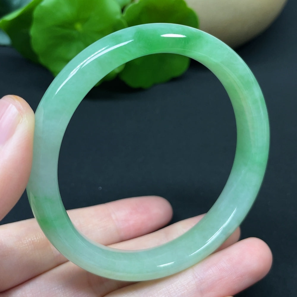 HKHQ Jadeite round bangle in size 54.7 with a weight of 37.95g, showcasing smooth, polished jadeite jewelry.