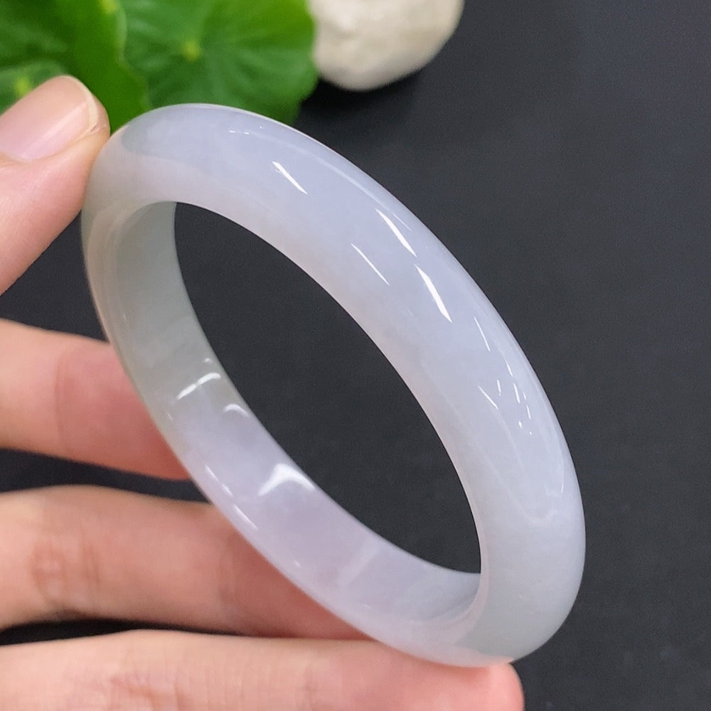 HKHQ jadeite round bangle in size 52.2 with a polished finish, weighing 40.24g, showcasing smooth, rounded craftsmanship.