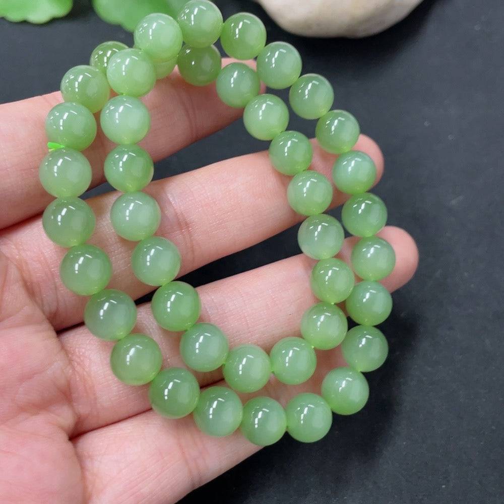 Hetian jade bead necklace with 7.6mm beads, weighing approximately 33.6g, featuring smooth, polished jade stones from HUILIU HQ.