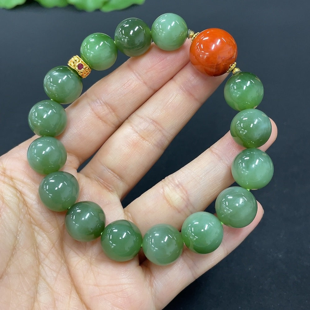 Hetian Jade Jasper bracelet with 11.8mm beads, 18k gold accents, and gold-plated red parts, designed by HKHQ.