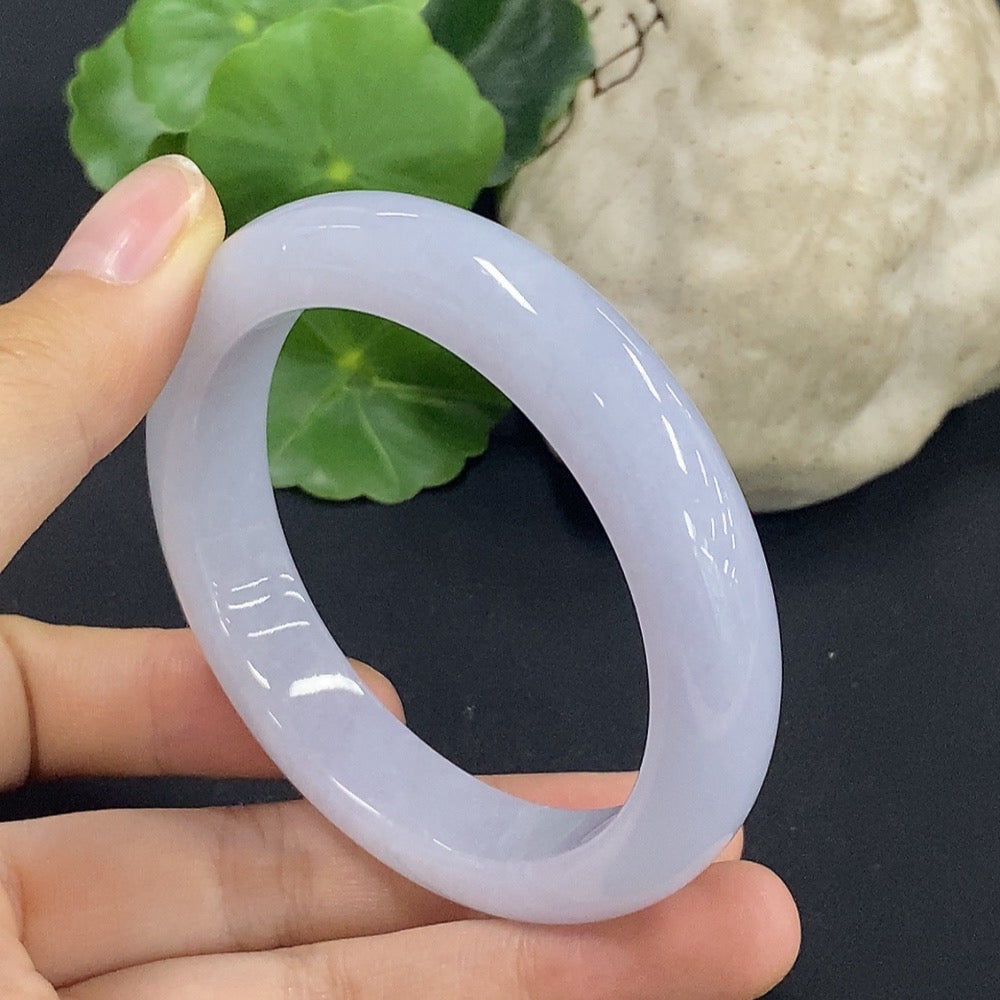 HKHQ jadeite round bracelet, size 53.7 with approximately 55.49g weight, featuring smooth, polished jade stones.