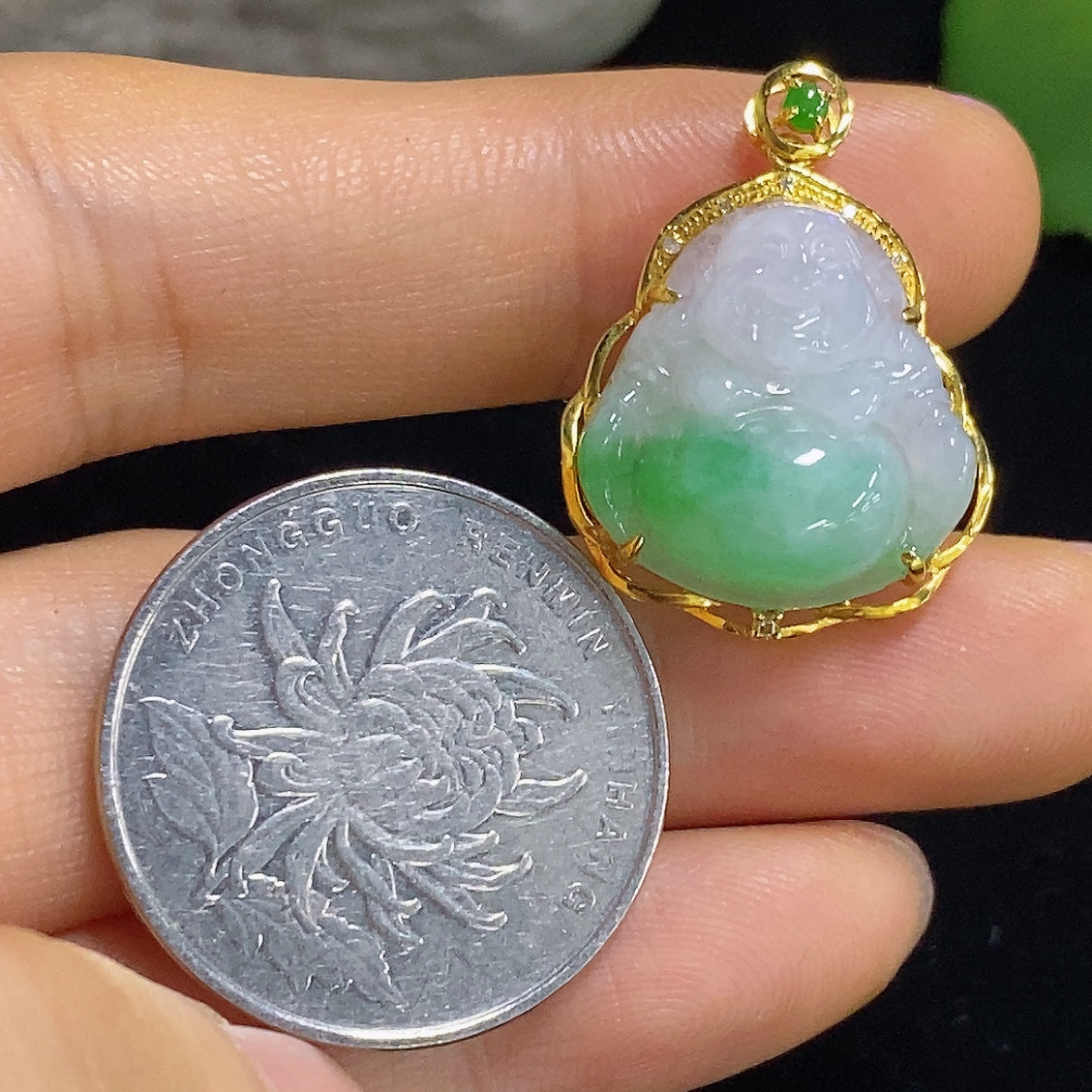 Jadeite Buddha pendant in 18K gold with diamond accents, weighs approx. 3.3g, featuring detailed jade craftsmanship.
